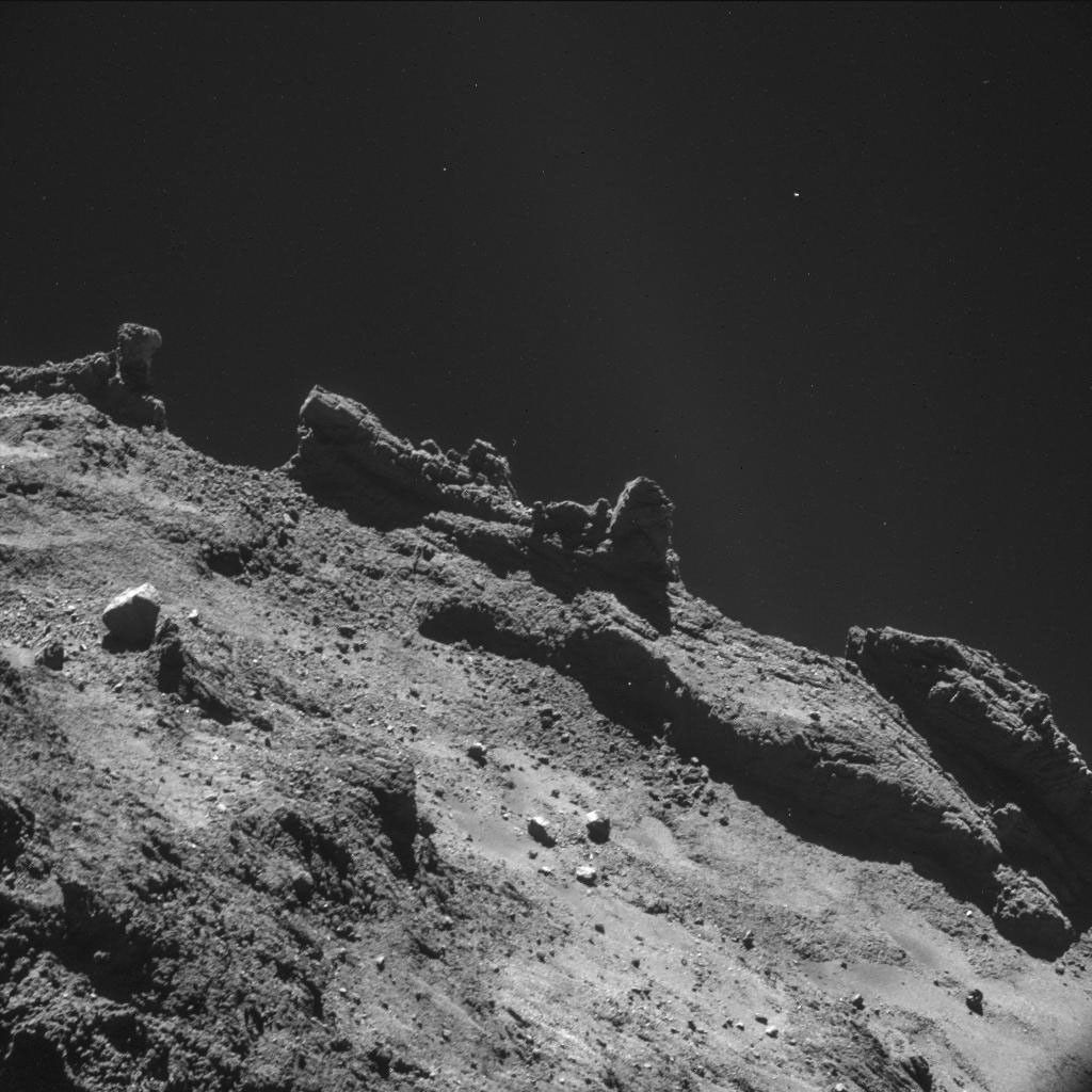 A jagged horizon of the nucleus of comet 67P/Churyumov-Gerasimenko appears in this image taken by the navigation camera on the ESA's Rosetta spacecraft during the second half of October 2014.
