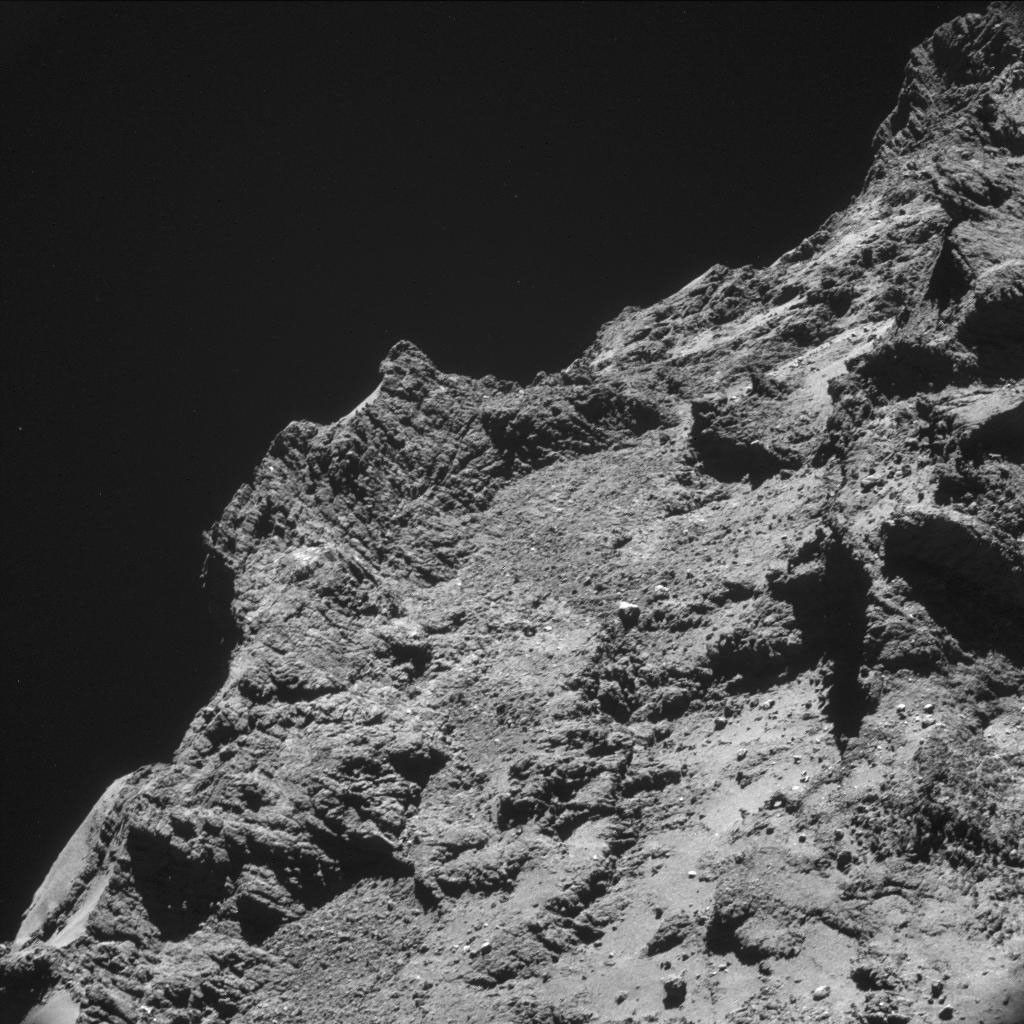 Some relatively rough terrain on the nucleus of comet 67P/Churyumov-Gerasimenko appears in this image taken by the navigation camera on the European Space Agency's Rosetta spacecraft in the second half of October 2014.