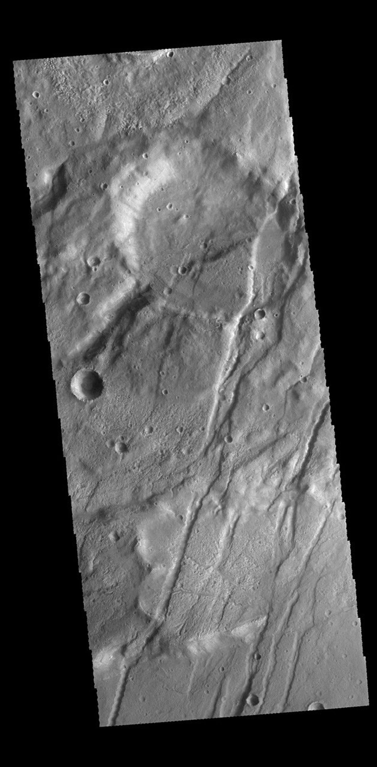The linear graben in this image from NASA's 2001 Mars Odyssey spacecraft are all part of Claritas Fossae.