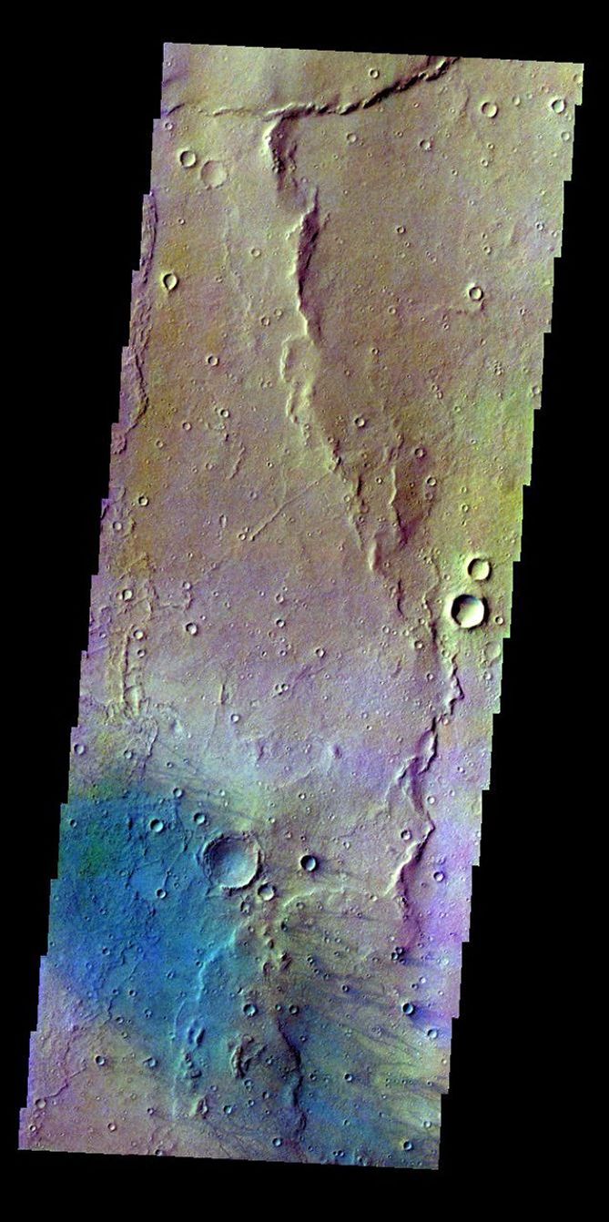 The THEMIS VIS camera contains 5 filters. The data from different filters can be combined in multiple ways to create a false color image. This false color image from NASA's 2001 Mars Odyssey spacecraft shows windstreaks on the floor of Gusev Crater.