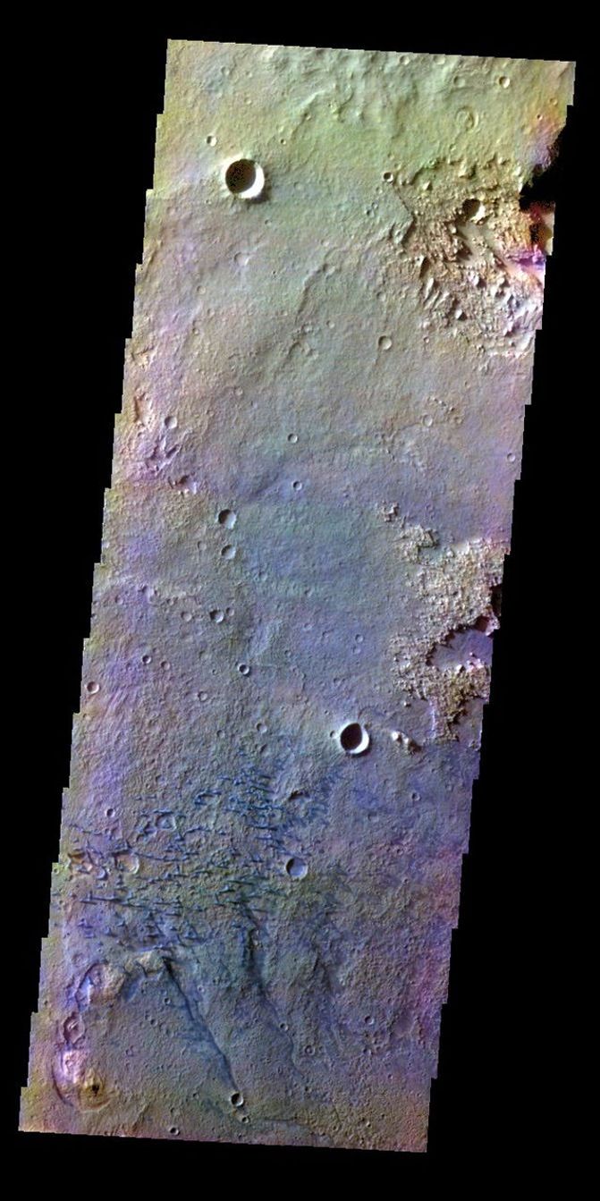 The THEMIS VIS camera contains 5 filters. The data from different filters can create a false color image. This false color image from NASA's 2001 Mars Odyssey spacecraft shows part of the floor of Schaeberle Crater, including small dunes.
