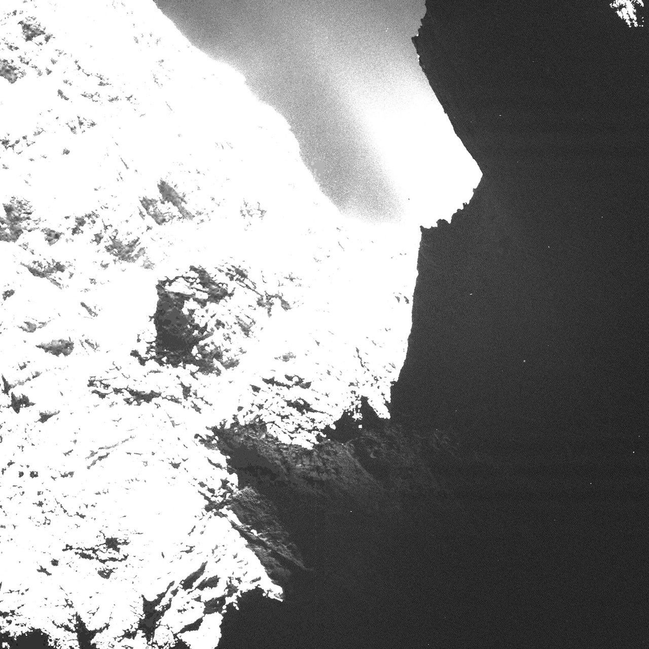 Dark Side of Comet 67P/Churyumov-Gerasimenko (Saturated) - NASA