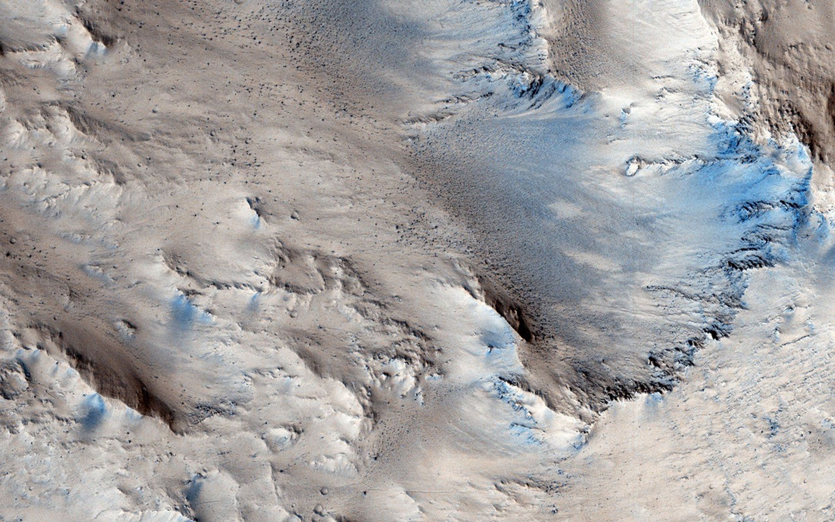 In this observation from NASA's 2001 Mars Odyssey, the morphology of these possible sedimentary fans match those found in Mojave Crater.