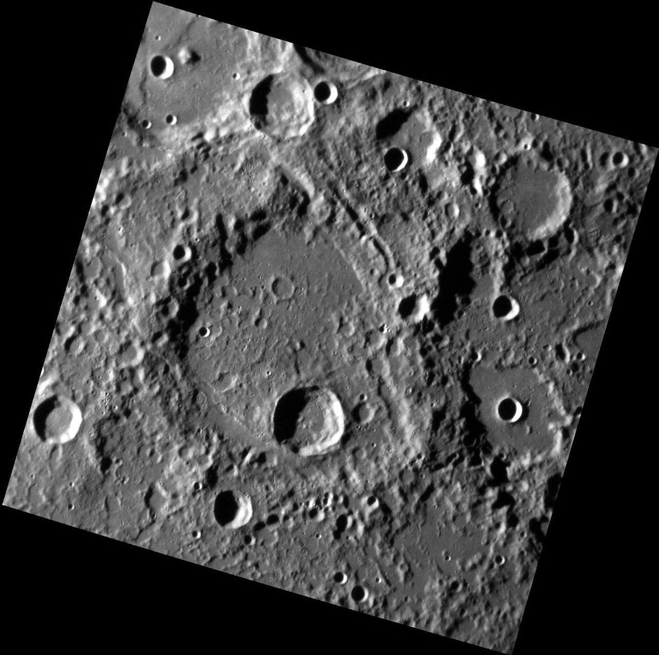 The large degraded impact crater near the center is Coleridge. It has been pummeled by later impacts, as seen by NASA's MESSENGER spacecraft.