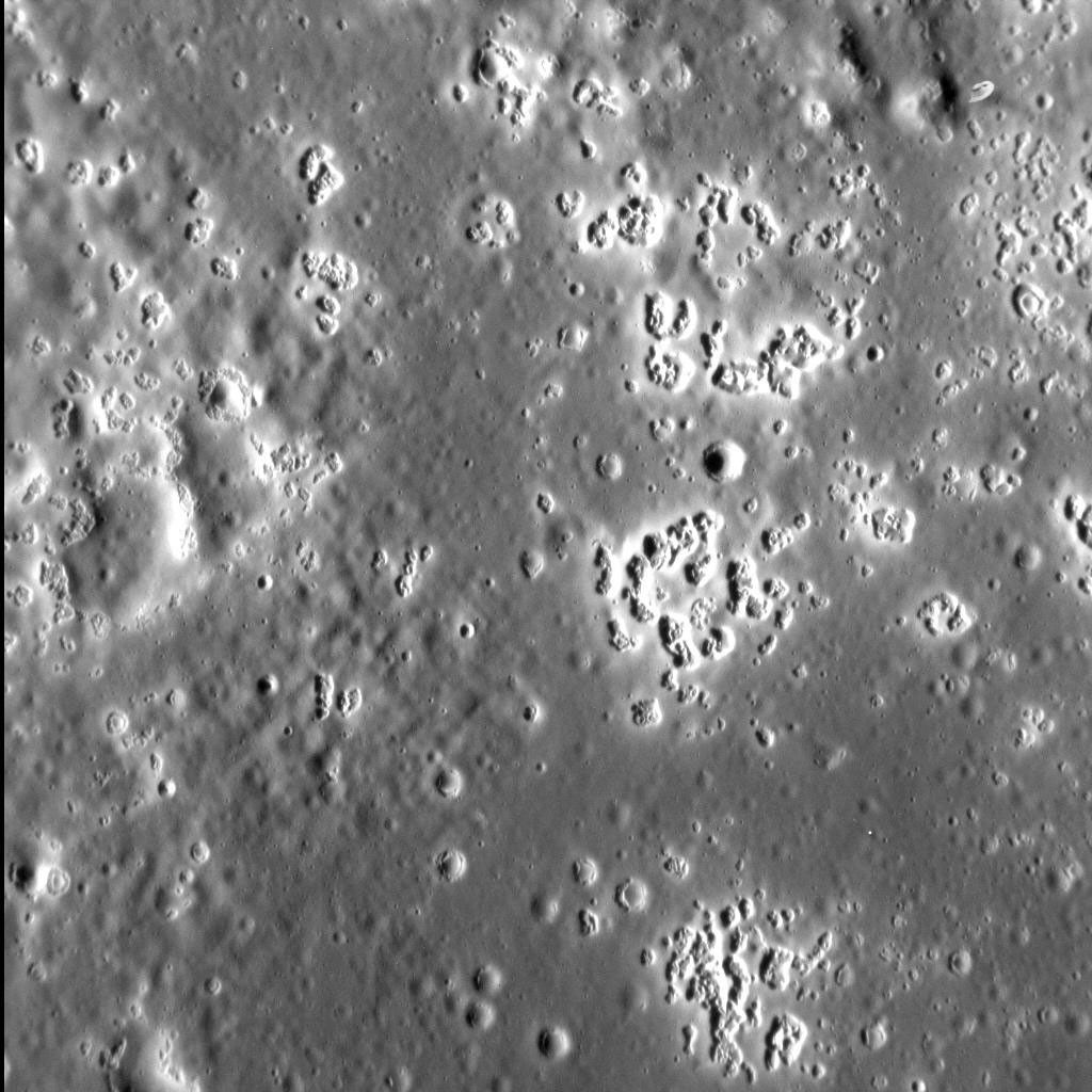 Mercury's hollows are among its most distinctive and unusual surface features. In this stunning view from NASA's MESSENGER spacecraft, we see a field of hollows in the western portion of the floor of Zeami impact basin.