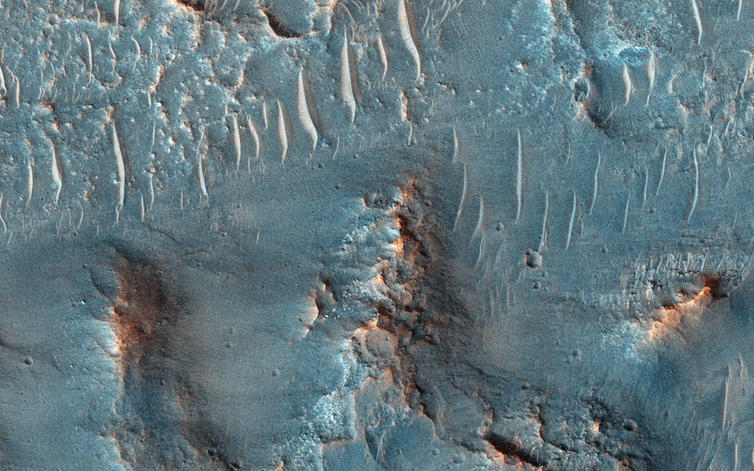 This observation from NASA's Mars Reconnaissance Orbiter shows samples of bedrock lithologies which give us a measure of the post-flood erosion and modification history for the floor of Kasei Valles.