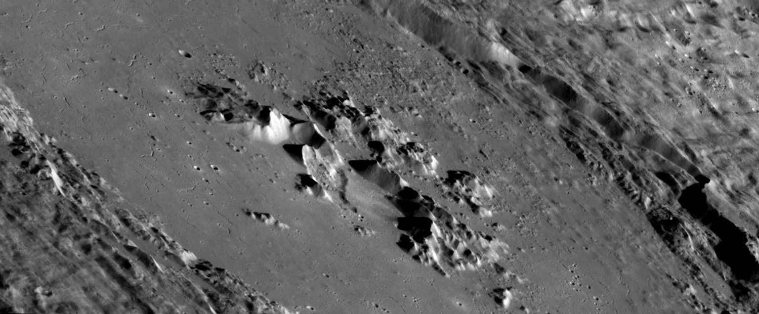 This mosaic of oblique images from NASA's MESSENGER spacecraft highlights the spectacular interior of Abedin crater. The crater floor is covered with once-molten rock melted by the impact event that formed Abedin.