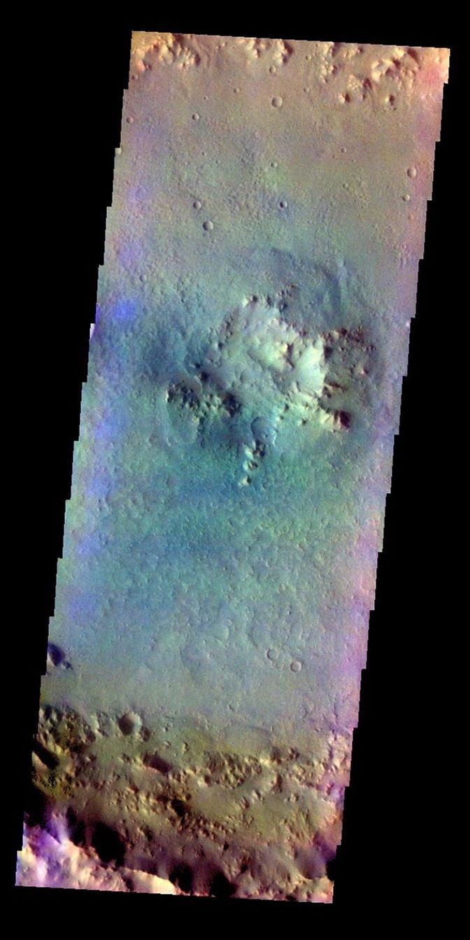 The THEMIS VIS camera contains 5 filters. The data from different filters can be combined in multiple ways to create a false color image. This image from NASA's 2001 Mars Odyssey spacecraft shows the floor of an unnamed crater in Terra Cimmeria.