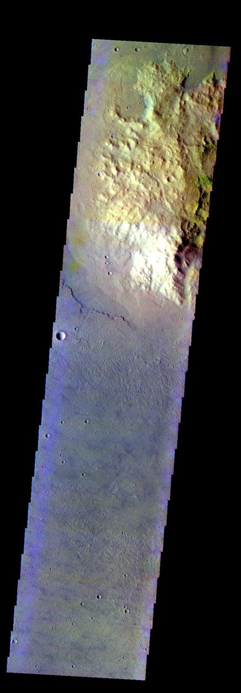 The THEMIS VIS camera contains 5 filters. The data from different filters can be combined in multiple ways to create a false color image. This image from NASA's 2001 Mars Odyssey spacecraft shows a highland surrounded by the lava flows of Daedalia Planum.