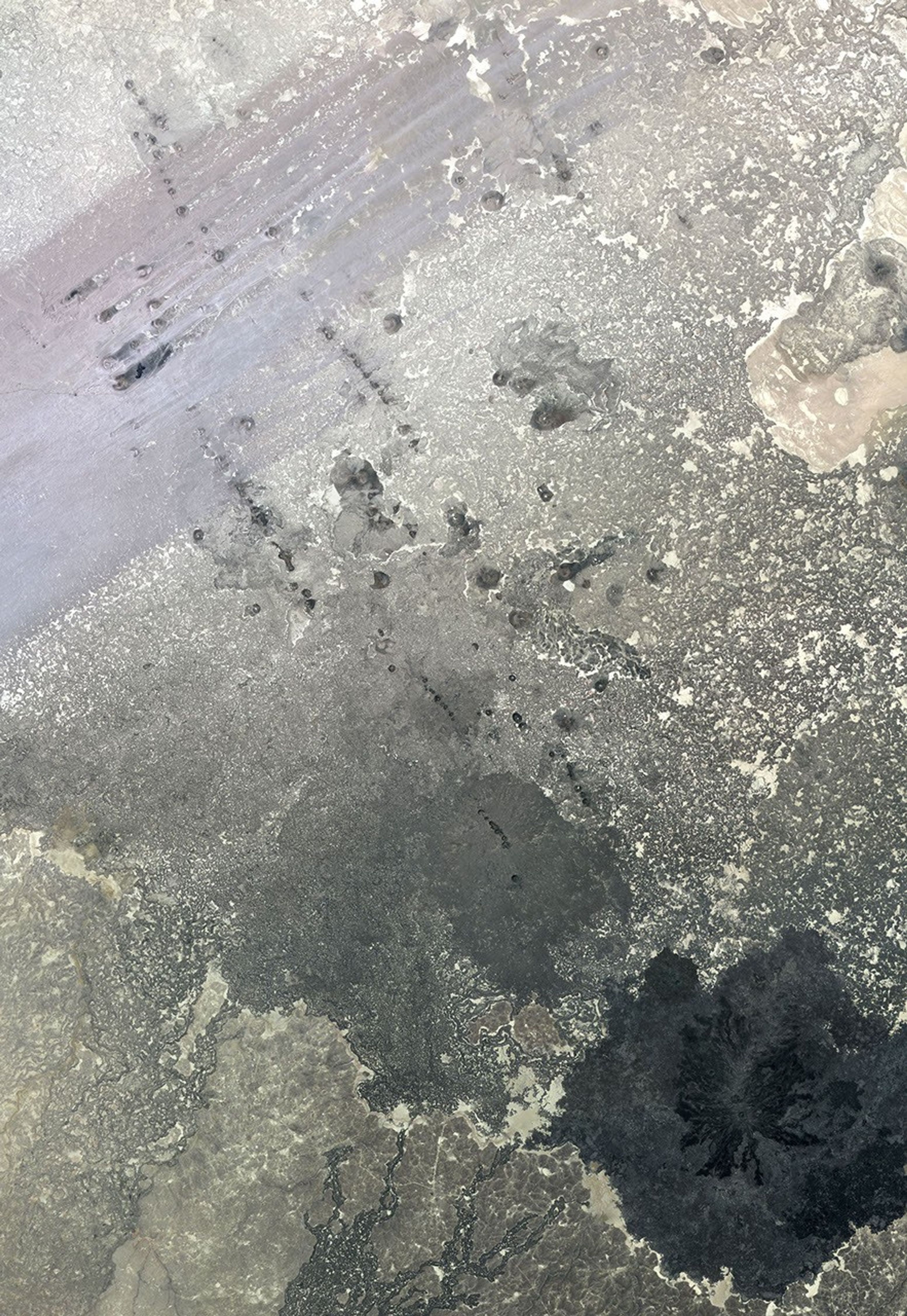 In southern Syria, the Azraq-Wadi as Sirhan Depression is the site of young volcanic activity, producing an extensive basaltic volcanic field, as shown in this image from NASA's Terra spacecraft.