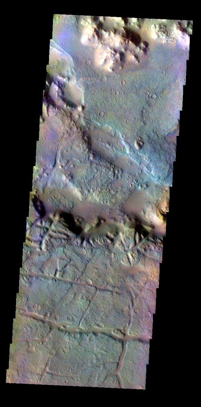 The THEMIS VIS camera contains 5 filters. Data from different filters can be combined in multiple ways to create a false color image. This image from NASA's 2001 Mars Odyssey spacecraft shows the region at the start of Morava Valles in Margaritifer Terra.