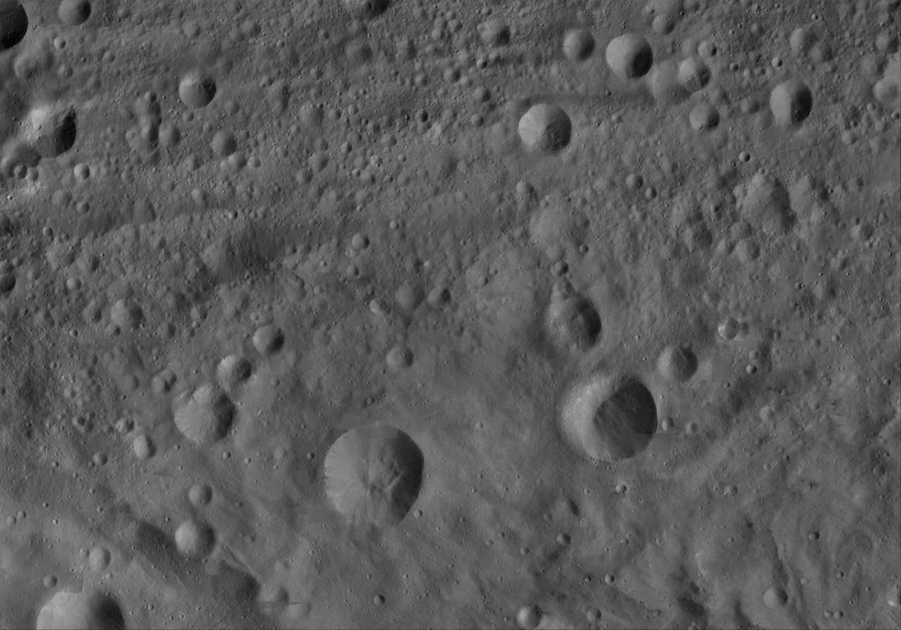 This image of Serena AV-L-18, from the atlas of the giant asteroid Vesta, was created from images taken as NASA's Dawn mission flew around the object, also known as a protoplanet.