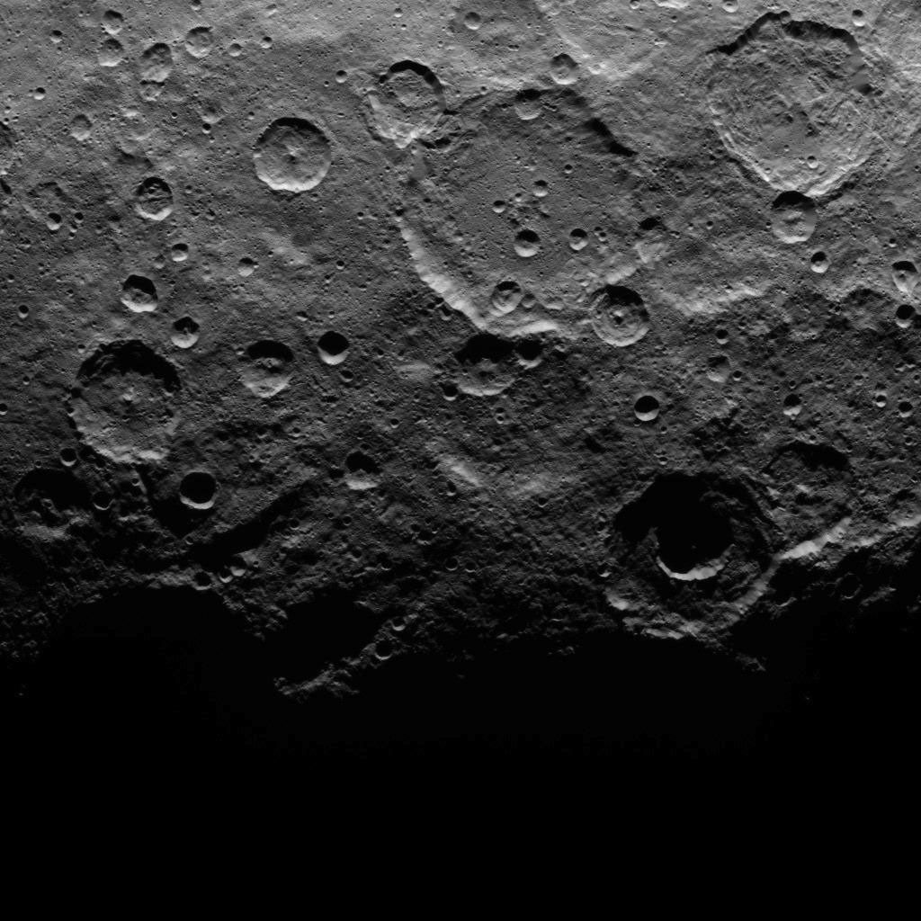 This image, taken on June 22, 2015 by NASA's Dawn spacecraft, shows a portion of the southern hemisphere of dwarf planet Ceres from an altitude of 2,700 miles (4,400 kilometers) with a resolution of 1,400 feet (410 meters) per pixel.