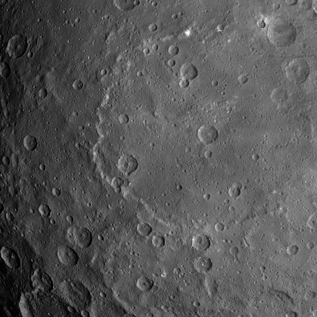 This image, taken by NASA's Dawn spacecraft, shows dwarf planet Ceres from an altitude of 2,700 miles (4,400 kilometers). The image, with a resolution of 1,400 feet (410 meters) per pixel, was taken on June 25, 2015.