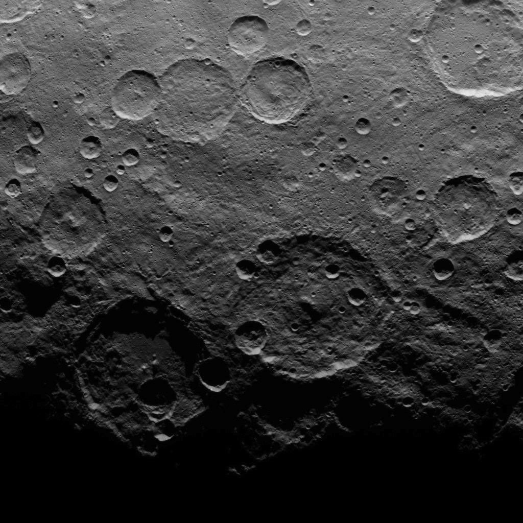 This image, taken on June 25, 2015 by NASA's Dawn spacecraft, shows a portion of the southern hemisphere of dwarf planet Ceres from an altitude of 2,700 miles (4,400 kilometers), with a resolution of 1,400 feet (410 meters) per pixel.