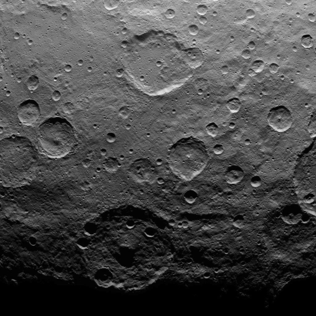 This image, taken on June 25, 2015 by NASA's Dawn spacecraft, shows a portion of the southern hemisphere of dwarf planet Ceres. The large crater with a central peak at bottom is Zadeni crater.