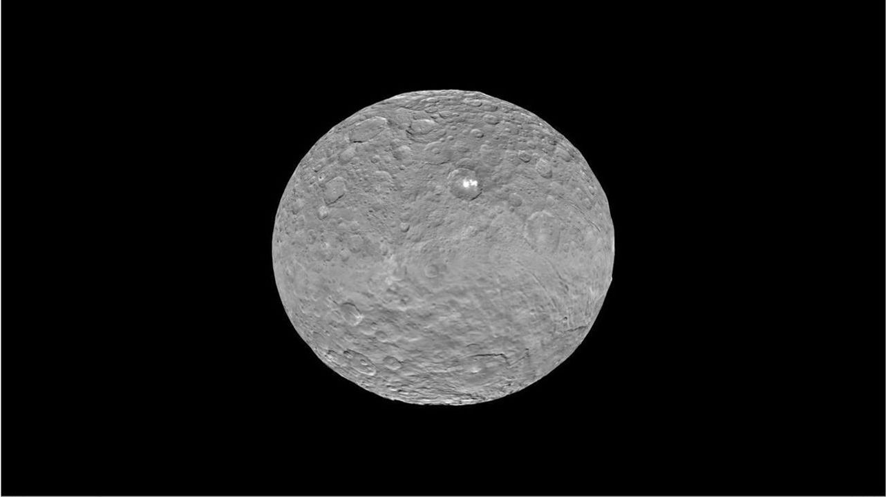 This frame from a video shows the bright spots in Occator crater on dwarf planet Ceres, generated from data from NASA's Dawn spacecraft.