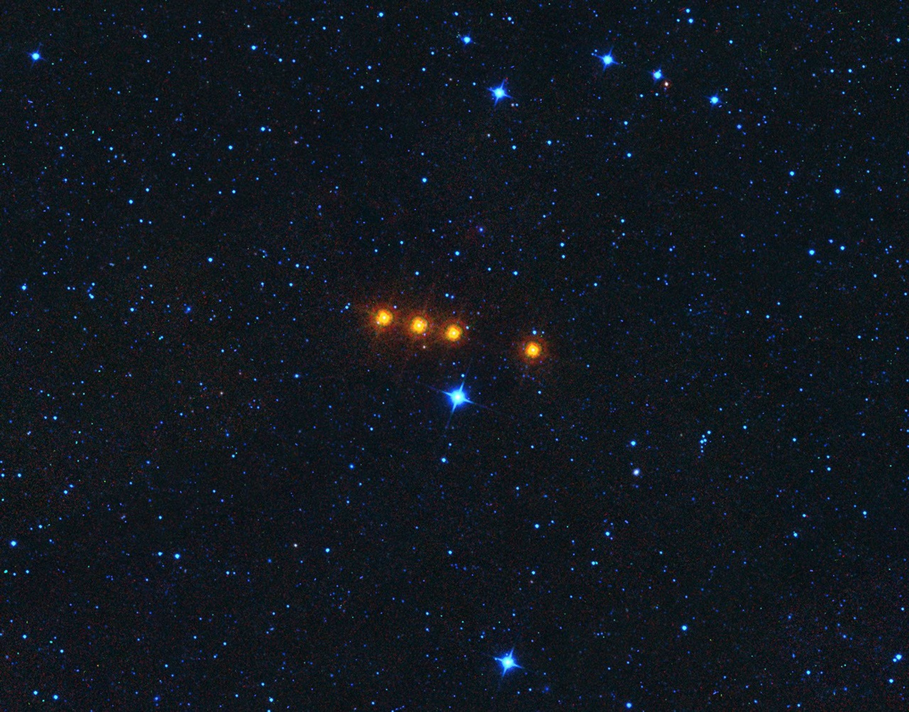 The asteroid Euphrosyne glides across a field of background stars in this time-lapse view from NASA's WISE spacecraft. Euphrosyne is quite dark in visible light, but glows brightly at infrared wavelengths.