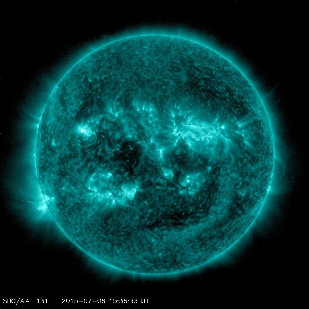 An eruption from the surface of the sun is conspicuous in the lower left portion of this July 6, 2015, image from NASA's Earth-orbiting Solar Dynamics Observatory (SDO).