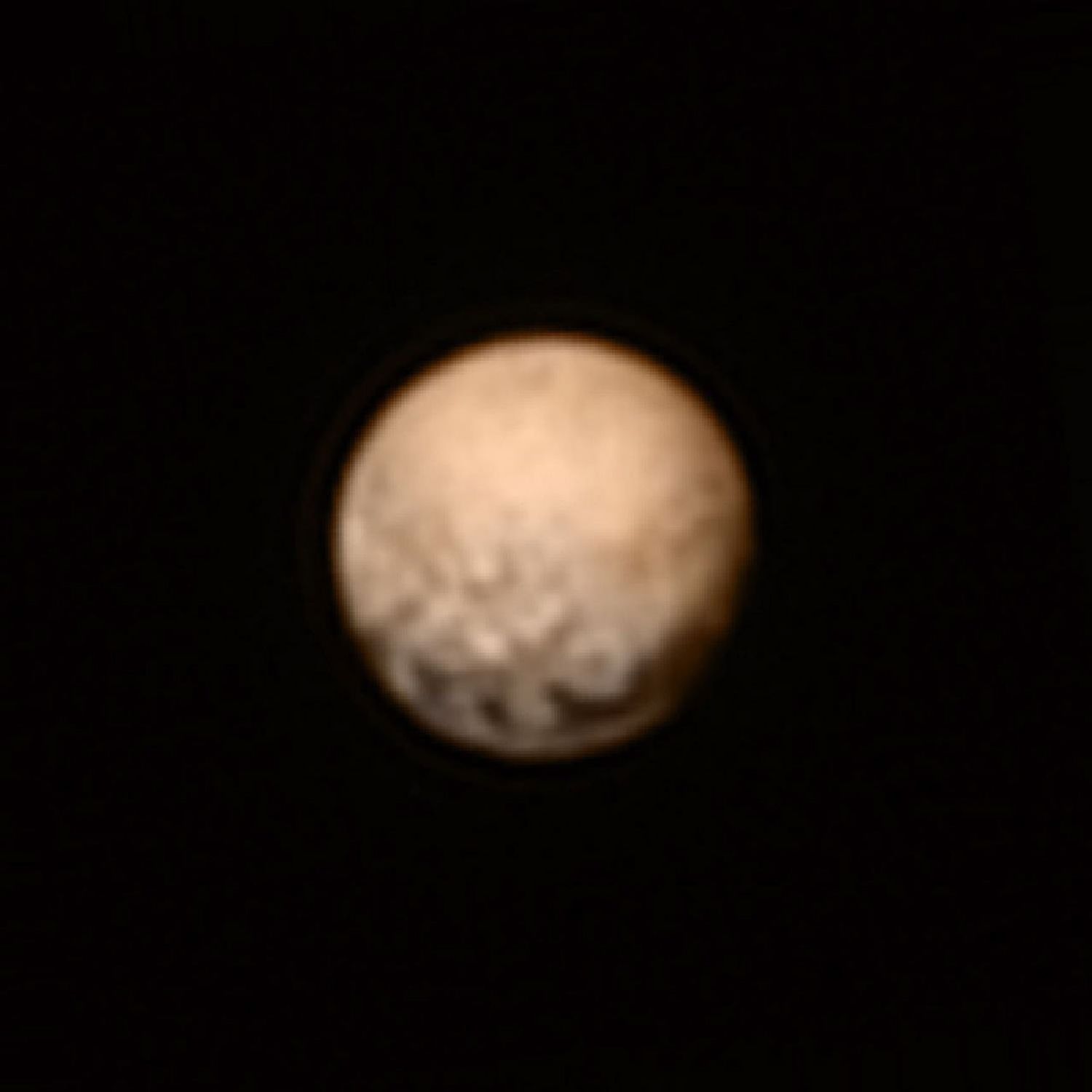 This color version of NASA's New Horizons Long Range Reconnaissance Imager (LORRI) picture of Pluto taken July 3, 2015, was created by adding color data from the Ralph instrument gathered earlier in the mission.