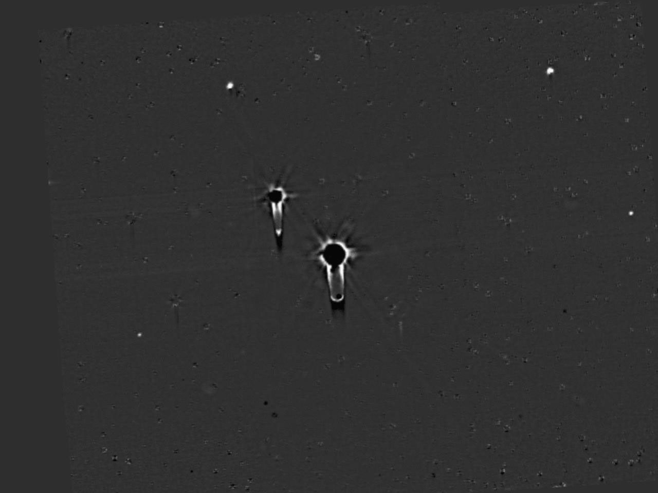 This four-frame movie shows NASA's New Horizons' final deep search for hazardous material around Pluto, obtained on July 1, 2015. These data allow a highly sensitive search for any new moons.