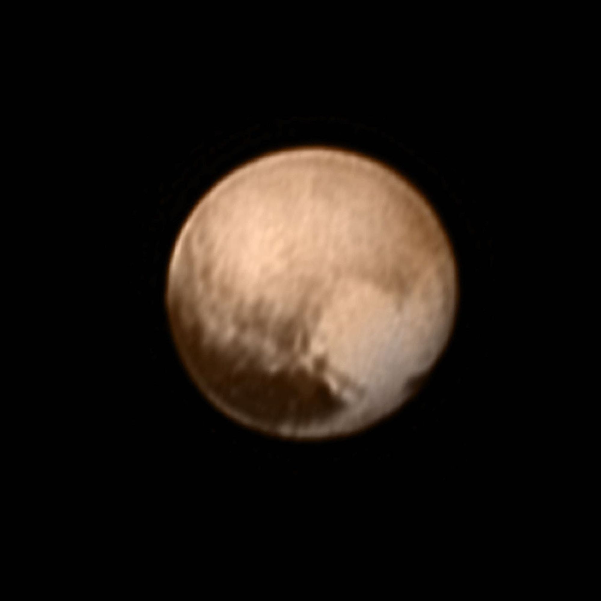 In the early morning hours of July 8, 2015, mission scientists received this new view of Pluto -- the most detailed yet returned by New Horizons. The image was taken on July 7, when the NASA spacecraft was just under 5 million miles (8 million kilometers)