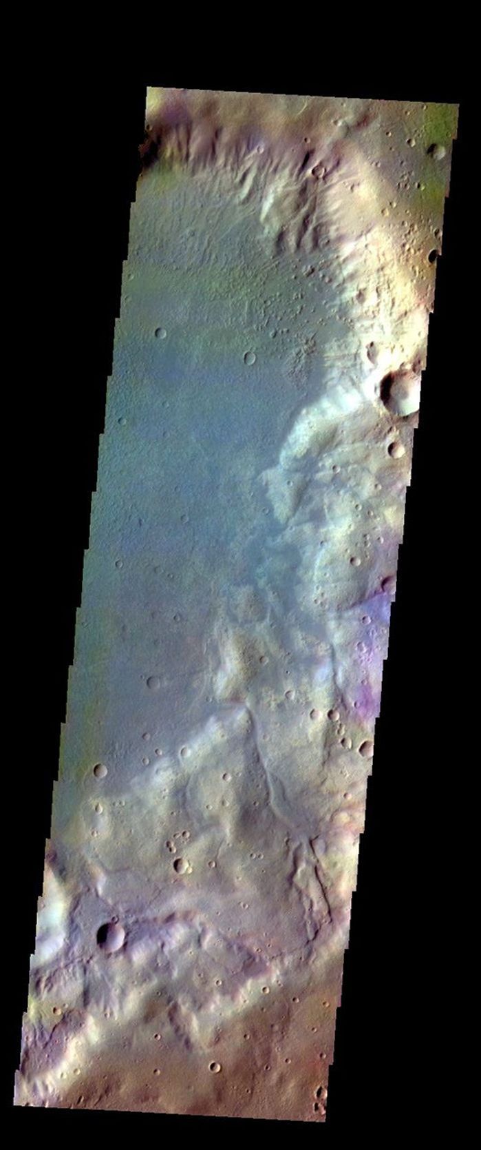 The THEMIS VIS camera contains 5 filters. The data from different filters can be combined in multiple many ways to create a false color image. This image from NASA's 2001 Mars Odyssey spacecraft shows a crater in Noachis Terra.