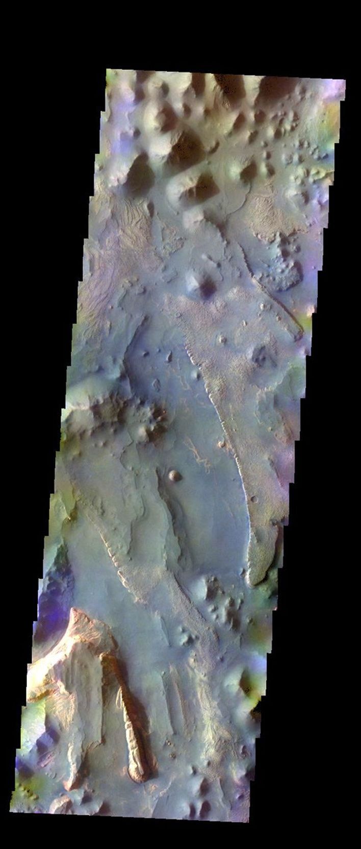 The THEMIS VIS camera contains 5 filters. The data from different filters can be combined in multiple ways to create a false color image. This image from NASA's 2001 Mars Odyssey spacecraft shows part of Aureum Chaos.