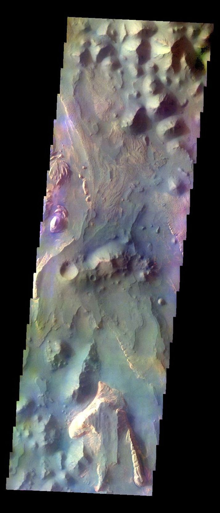 The THEMIS VIS camera contains 5 filters. The data from different filters can be combined in multiple ways to create a false color image. This image from NASA's 2001 Mars Odyssey spacecraft shows part of Aureum Chaos.