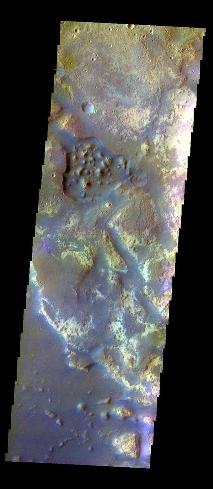 The THEMIS VIS camera contains 5 filters. The data from different filters can be combined in multiple ways to create a false color image. This image from NASA's 2001 Mars Odyssey spacecraft shows where Mawrth Vallis empties into Chryse Planitia.
