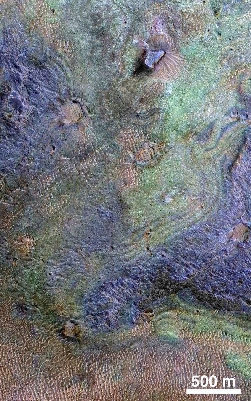 This view combines information from two instruments on NASA's Mars Reconnaissance Orbiter to map color-coded composition over the shape of the ground in a small portion of the Nili Fossae plains region of Mars' northern hemisphere.