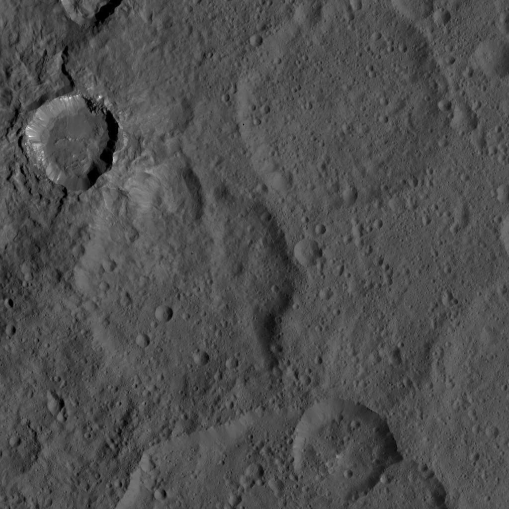 This image, taken by NASA's Dawn spacecraft, shows a portion of the southern hemisphere of dwarf planet Ceres from an altitude of 915 miles (1,470 kilometers). The image, with a resolution of 450 feet (140 meters) per pixel, was taken on August 21, 2015.