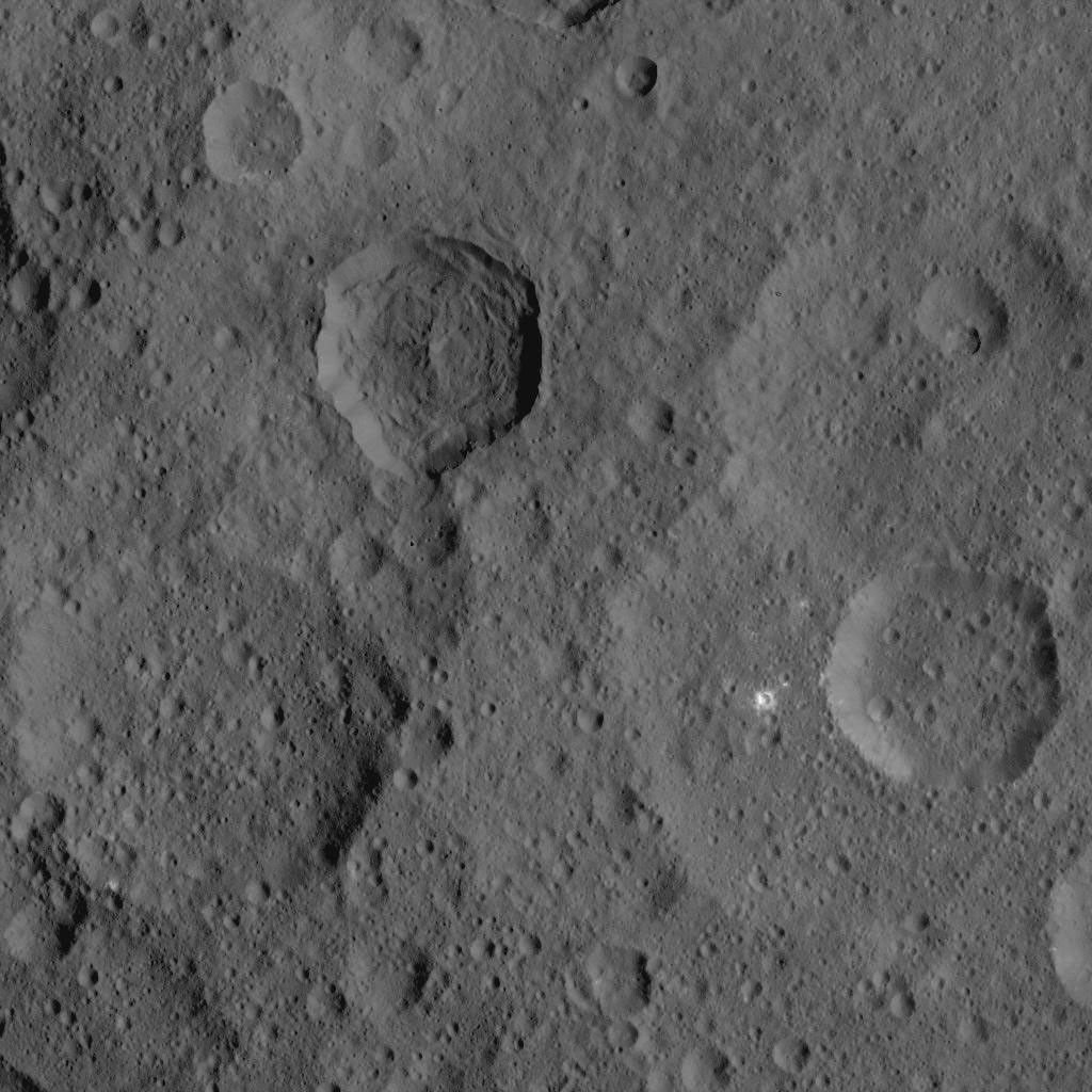 This image, taken by NASA's Dawn spacecraft, shows a portion of the northern hemisphere of dwarf planet Ceres from an altitude of 915 miles (1,470 kilometers). The image, with a resolution of 450 feet (140 meters) per pixel, was taken on August 21, 2015.