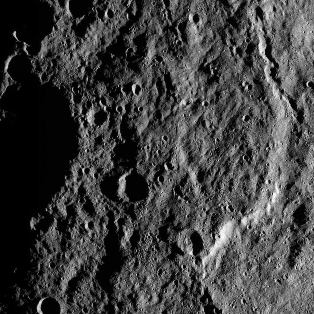 This image, taken by NASA's Dawn spacecraft, shows the surface of dwarf planet Ceres from an altitude of 915 miles (1,470 kilometers). The image, with a resolution of 450 feet (140 meters) per pixel, was taken on August 26, 2015.