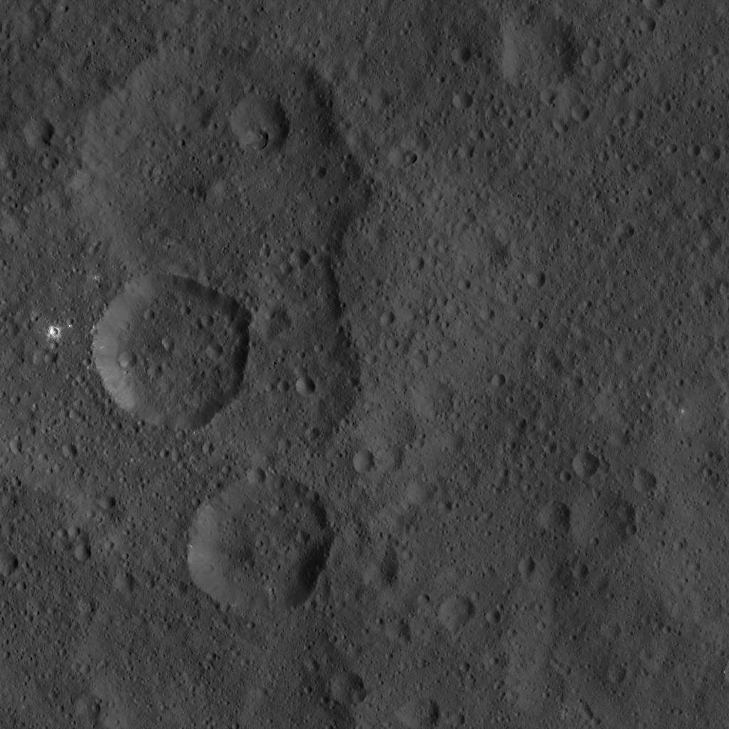 This image, taken by NASA's Dawn spacecraft, shows the surface of dwarf planet Ceres from an altitude of 915 miles (1,470 kilometers). The image was taken on August 21, 2015, and has a resolution of 450 feet (140 meters) per pixel.