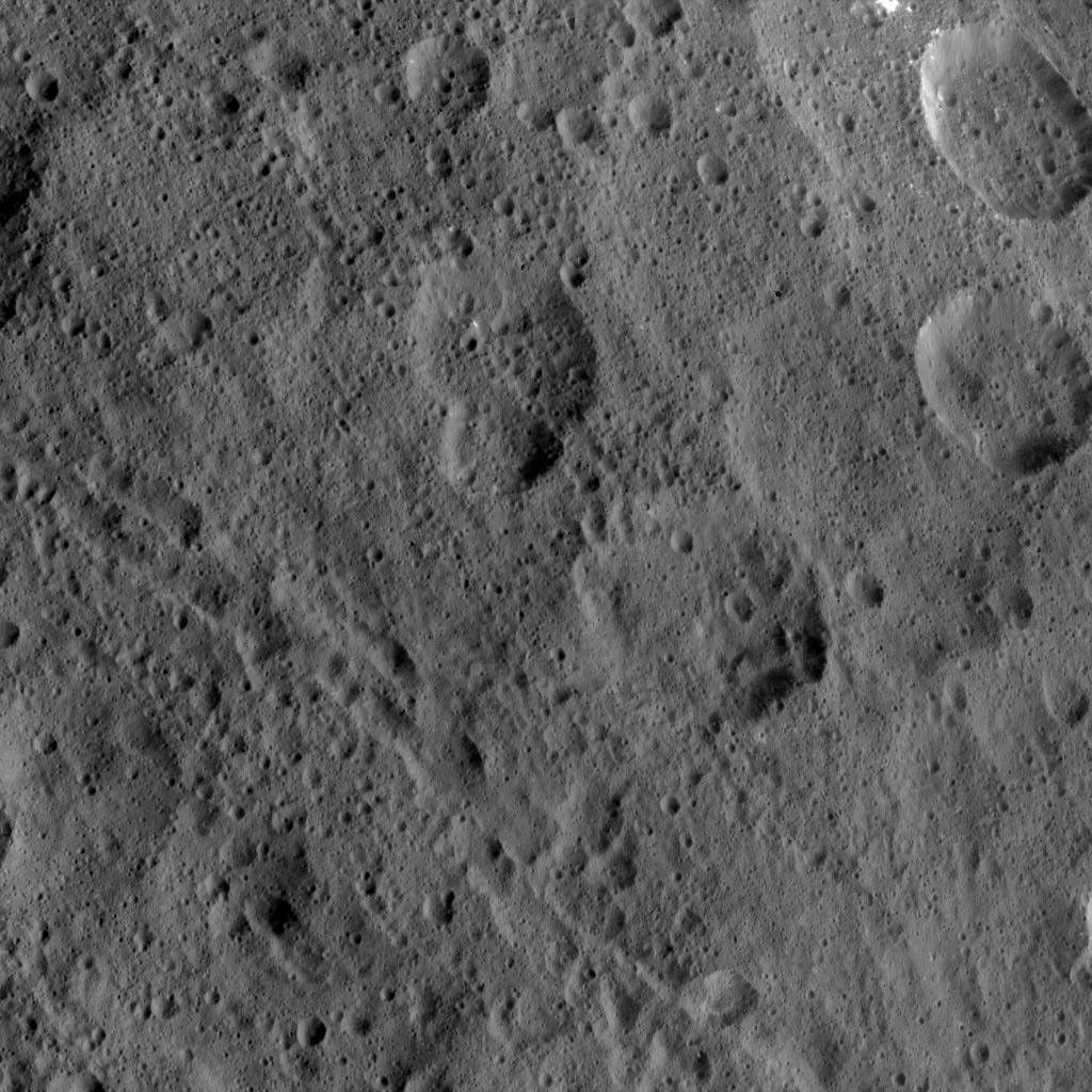 This image, taken by NASA's Dawn spacecraft, shows the surface of dwarf planet Ceres from an altitude of 915 miles (1,470 kilometers). The image was taken on September 9, 2015, and has a resolution of 450 feet (140 meters) per pixel.