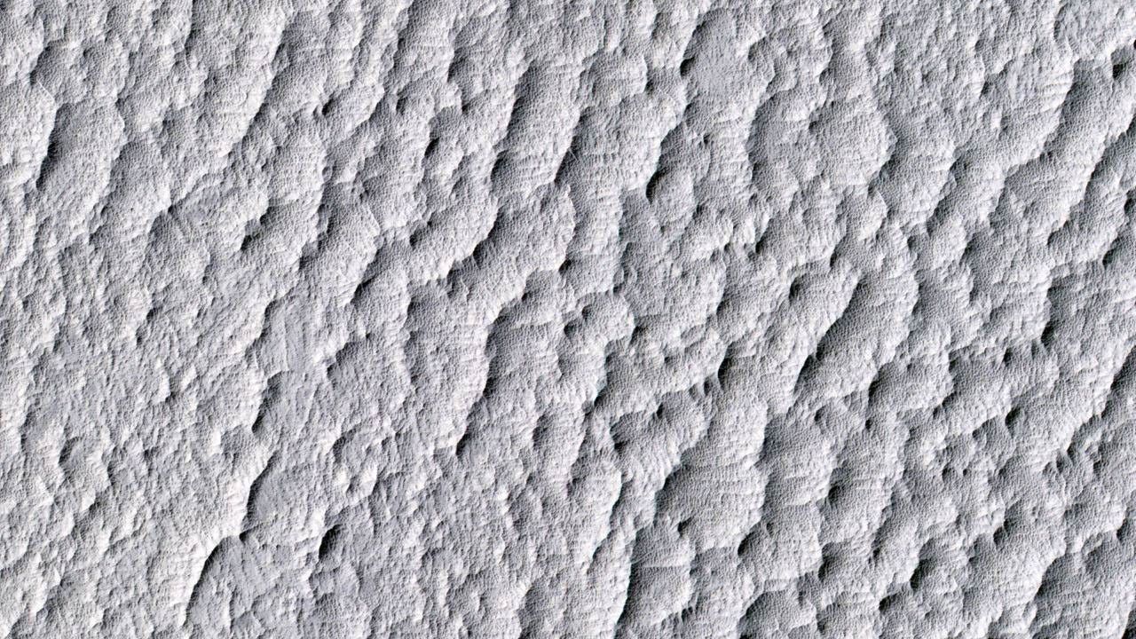 This image from NASA's Mars Reconnaissance Orbiter shows a location on Mars associated with the best-selling novel and Hollywood movie, 'The Martian.' It is the science-fiction tale's planned landing site for the Ares 4 mission.