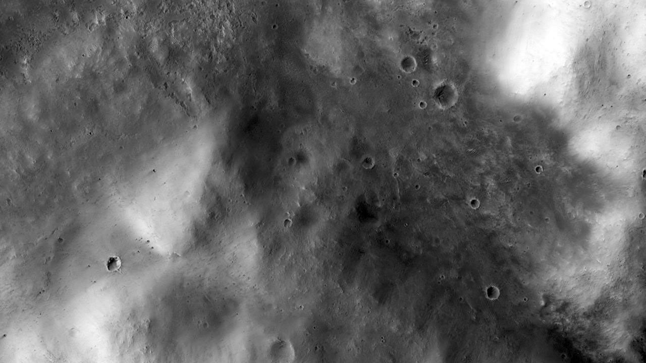 In the best-selling novel 'The Martian' and the movie based on it, stranded astronaut Mark Watney's adventures take him to the rim of Mawrth Crater. This image from NASA's Mars Reconnaissance Orbiter shows the nature of this terrain.