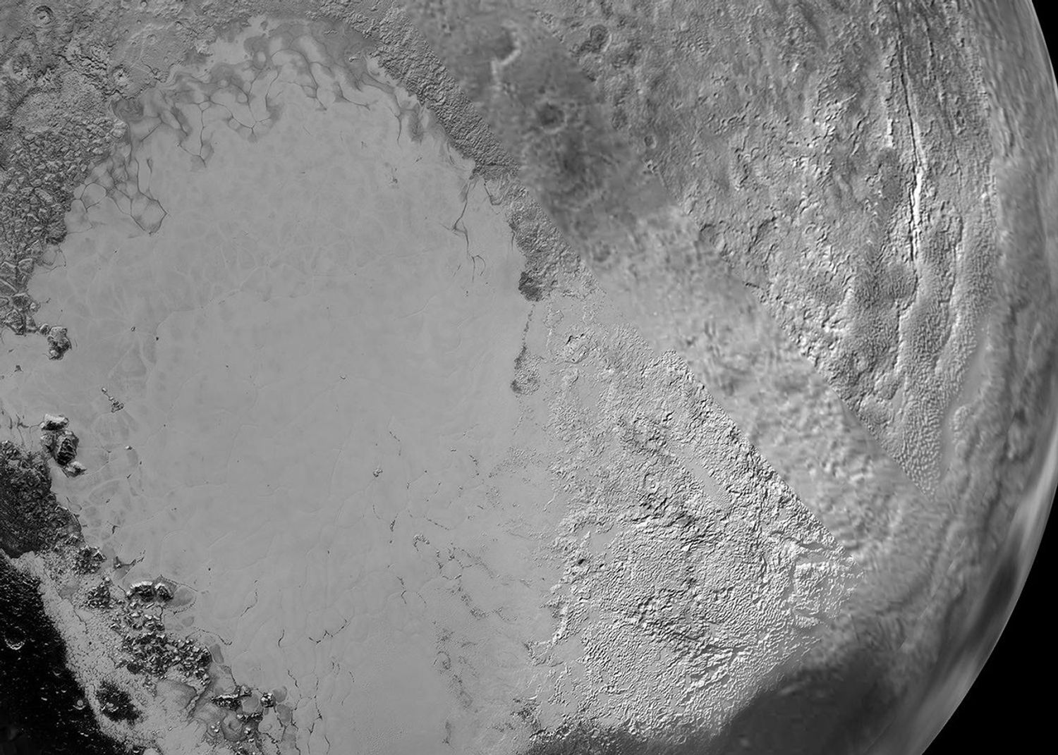Sputnik Planum is the informal name of the smooth, light-bulb shaped region on the left of this composite of several of NASA's New Horizons images of Pluto.