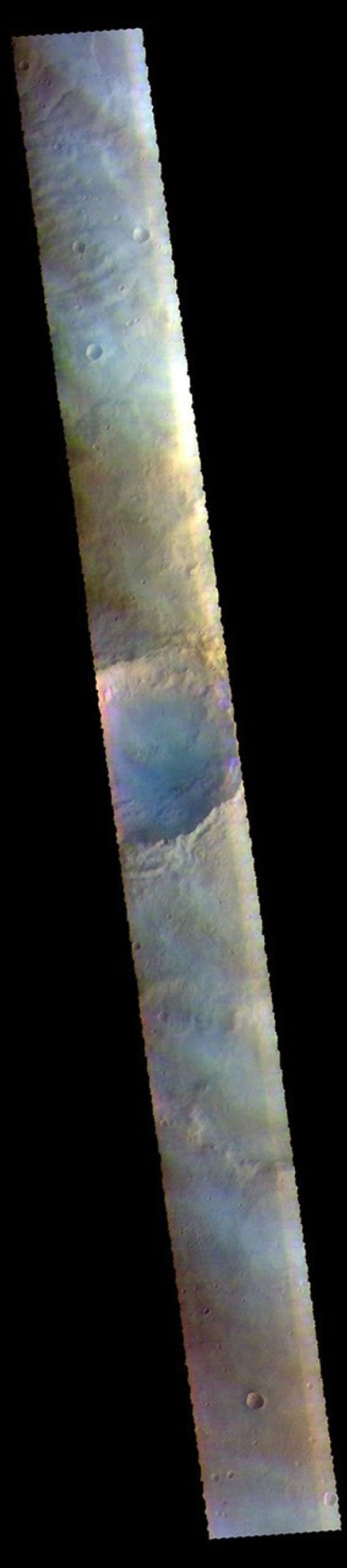The THEMIS VIS camera contains 5 filters. The data from different filters can be combined in multiple ways to create a false color image. The faint bluish white tone in this image from NASA's 2001 Mars Odyssey spacecraft are clouds in Noachis Terra.