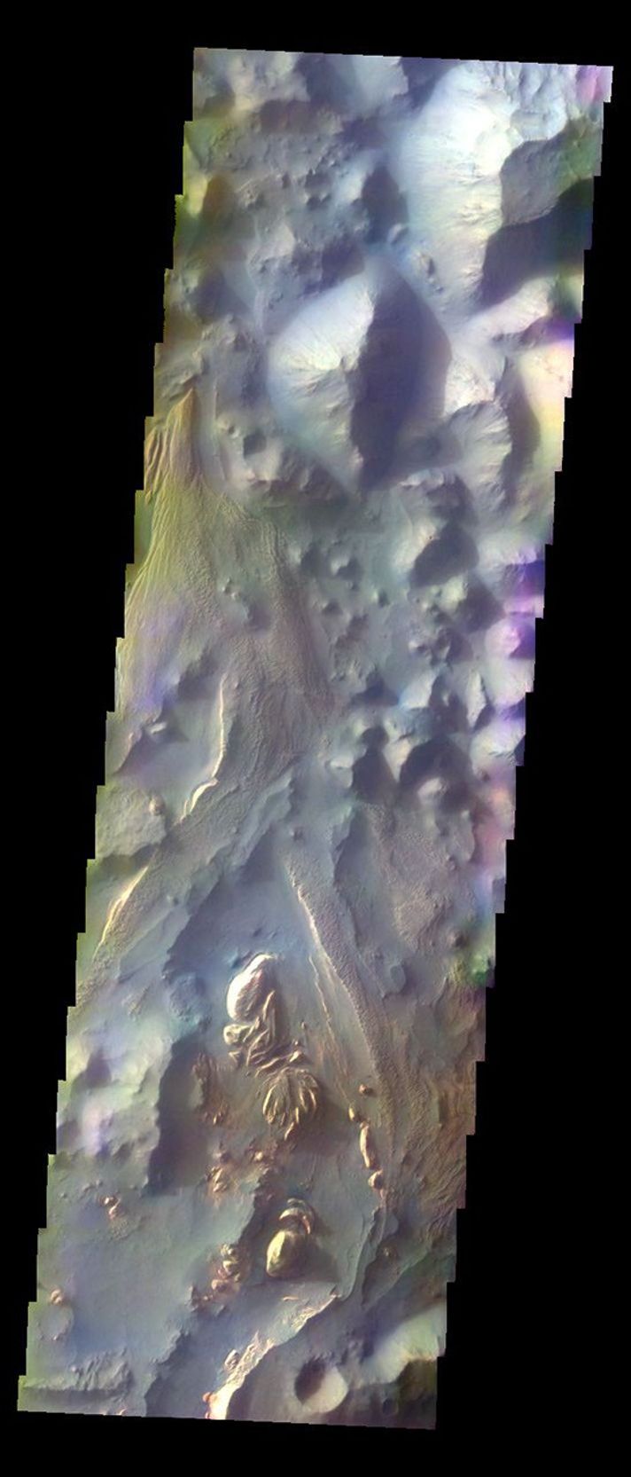 The THEMIS VIS camera contains 5 filters. The data from different filters can be combined in multiple ways to create a false color image. This image from NASA's 2001 Mars Odyssey spacecraft shows part of Aureum Chaos.