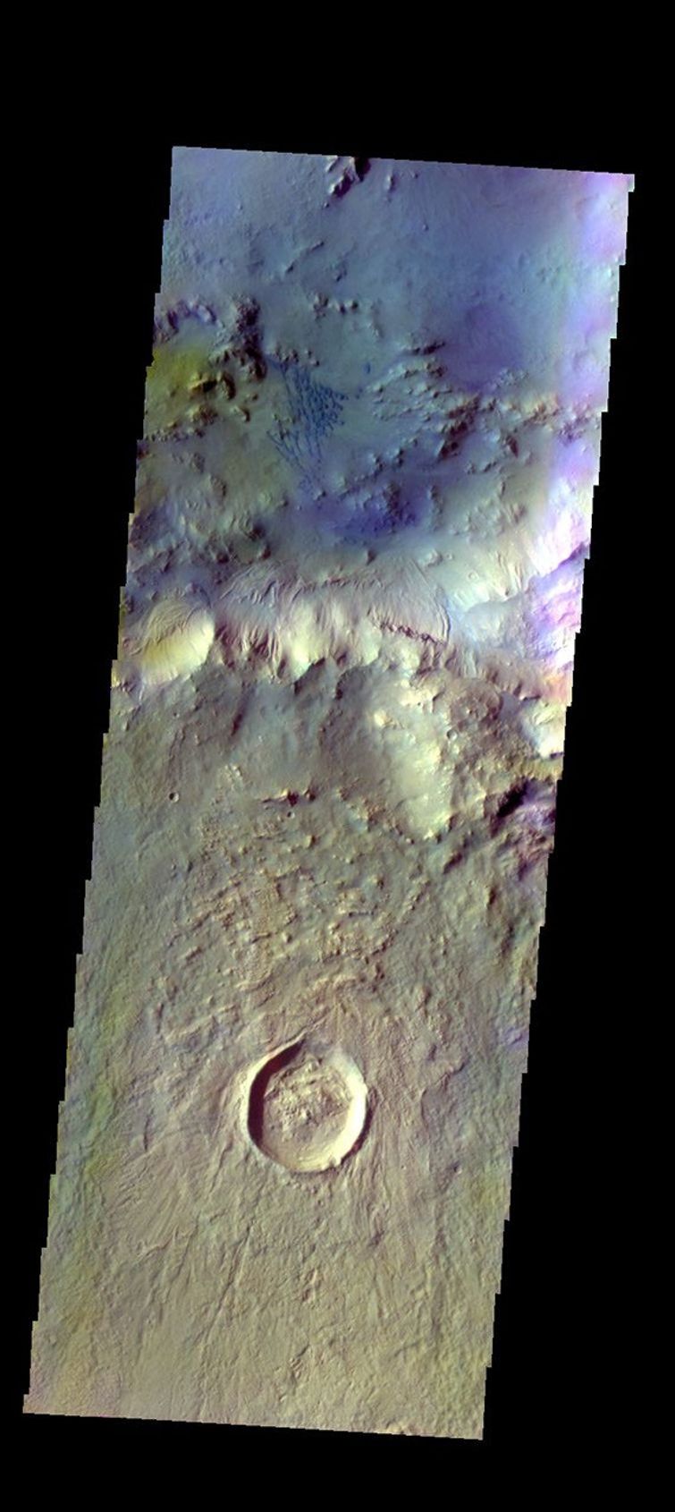 The THEMIS VIS camera contains 5 filters. The data from different filters can be combined in multiple ways to create a false color image. This image from NASA's 2001 Mars Odyssey spacecraft shows small dunes on the floor of Bamberg Crater.