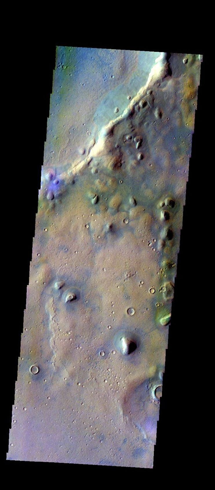 The THEMIS VIS camera contains 5 filters. The data from different filters can be combined in multiple ways to create a false color image. This image from NASA's 2001 Mars Odyssey spacecraft shows part of the rim of Tyndall Crater.