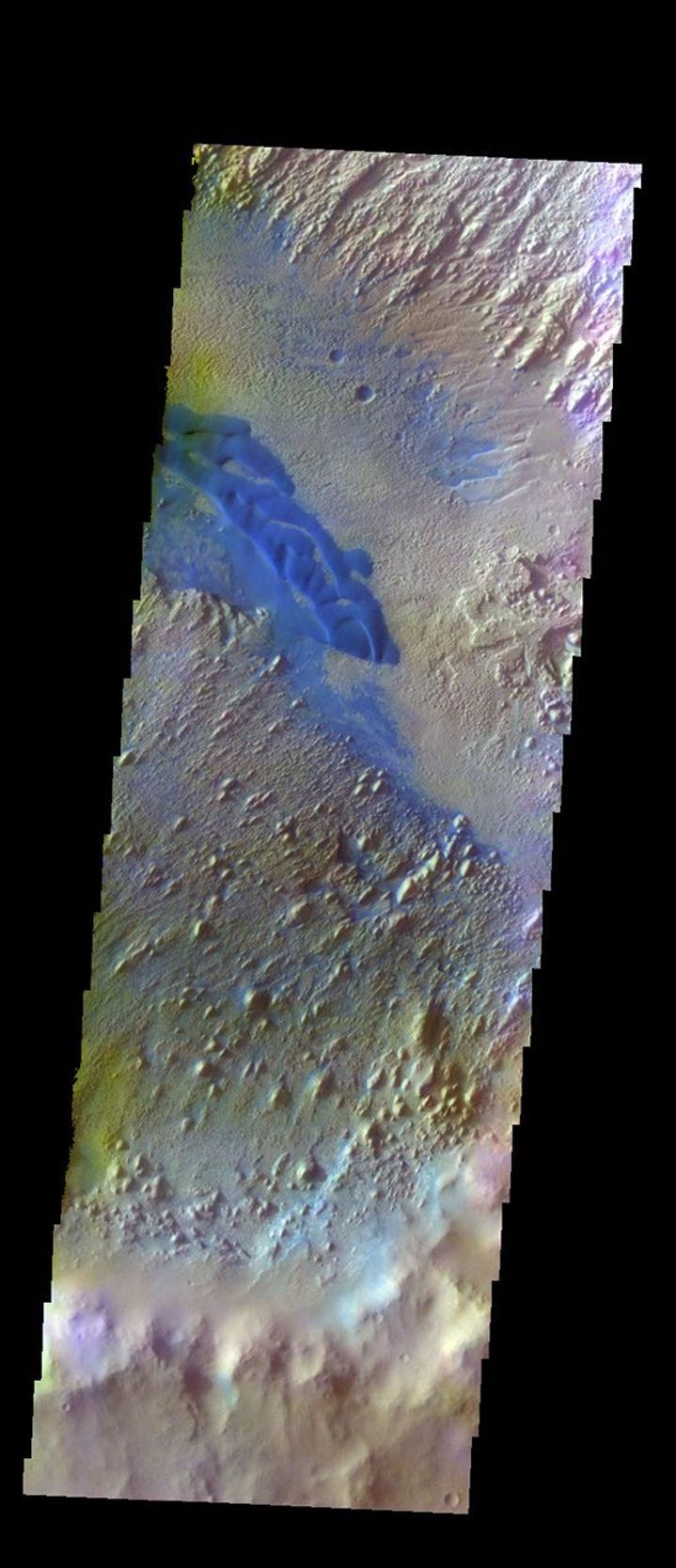 The THEMIS VIS camera contains 5 filters. The data from different filters can be combined in multiple ways to create a false color image. This image from NASA's 2001 Mars Odyssey spacecraft shows part of the floor of Danielson Crater.