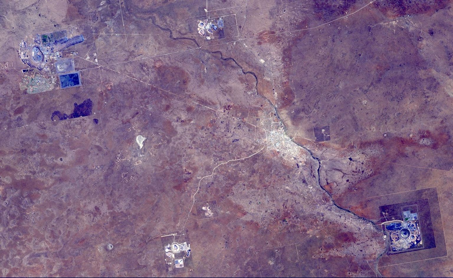 This image from NASA's Terra spacecraft shows the Orapa diamond mine, the world's largest diamond mine by area. The mine is located in Botswana.