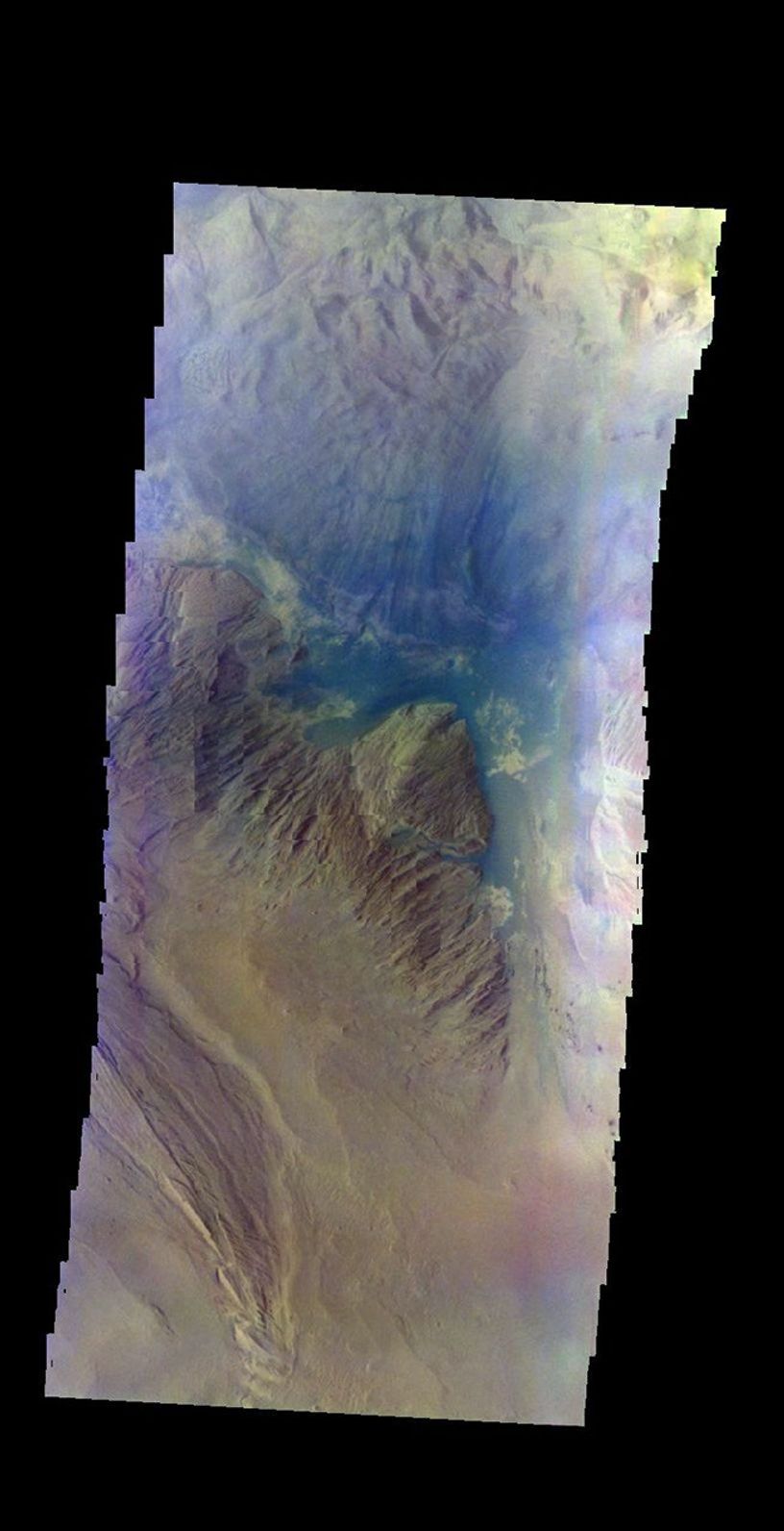 The THEMIS camera contains 5 filters. The data from different filters can be combined in multiple ways to create a false color image. This false image from NASA's 2001 Mars Odyssey spacecraft shows part of Ophir Chasma.
