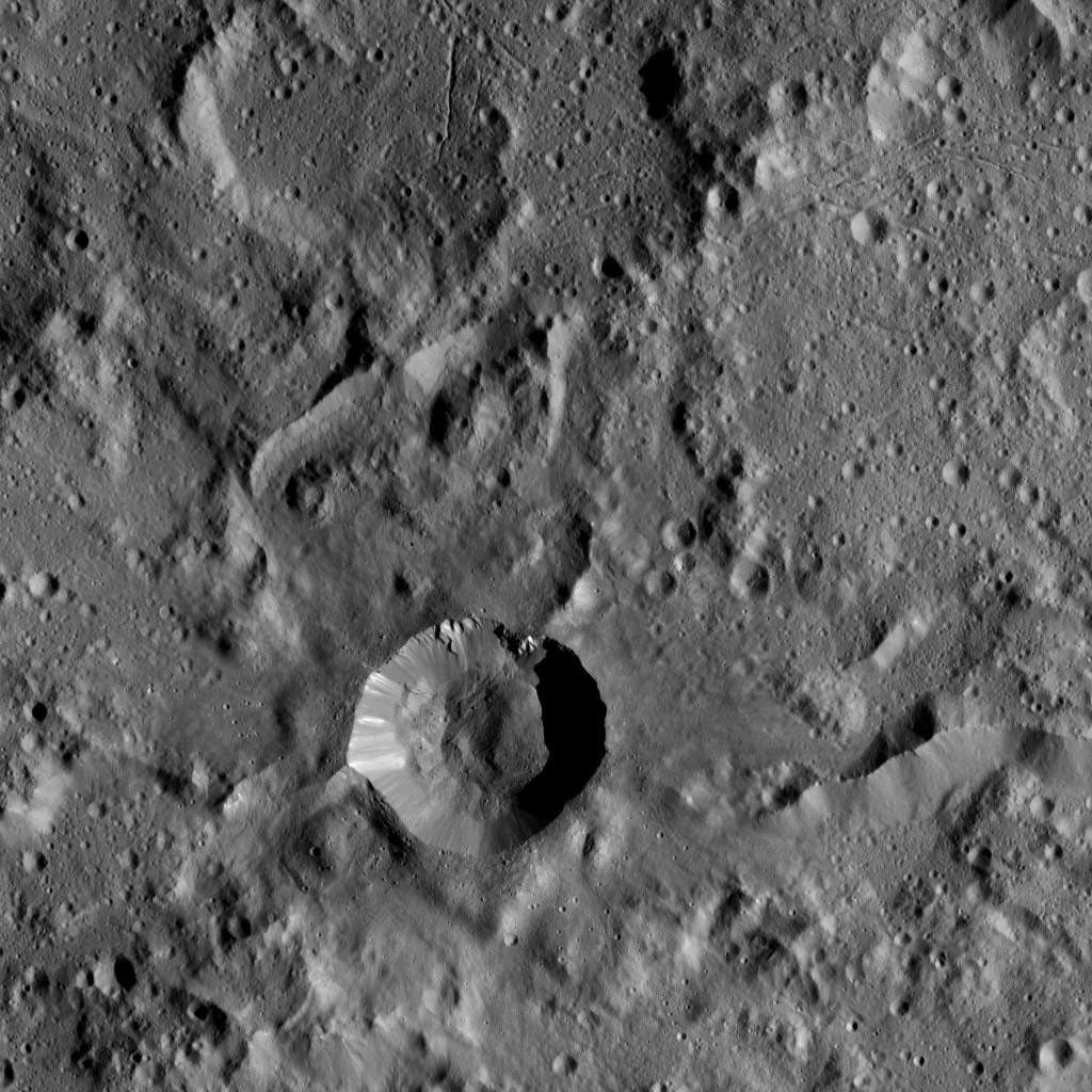 NASA's Dawn spacecraft flys over dwarf planet Ceres which Dawn has been orbiting for mre than a year, providing us with fascinating views of an alien world.