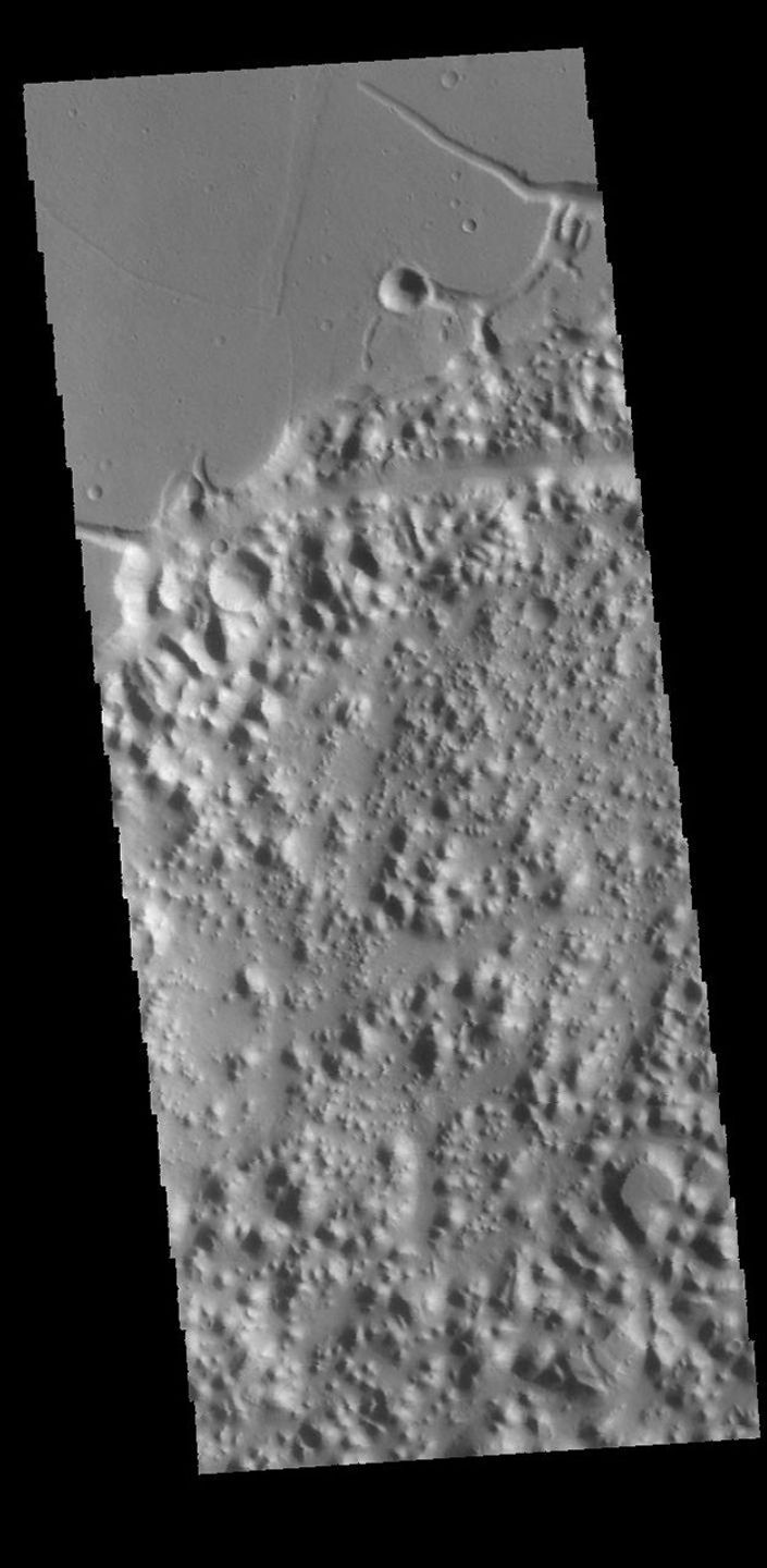 This image captured by NASA's 2001 Mars Odyssey spacecraft shows a portion of Nilus Chaos. Located north of Kasei Vallis, this chaos formed at the elevation boundary between Kasei Valles and the surrounding plains.