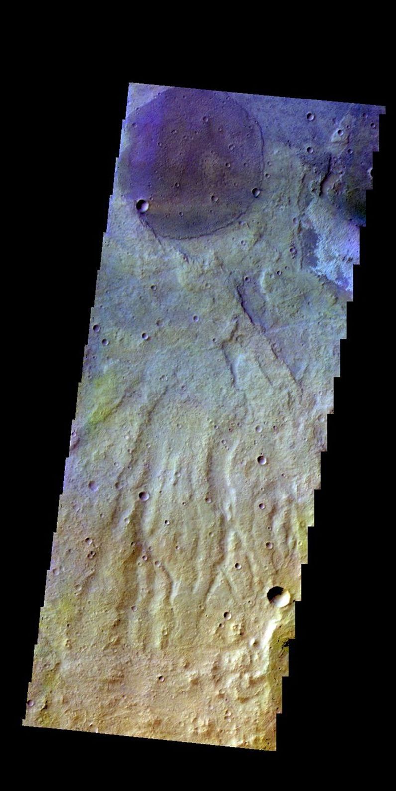 The THEMIS camera contains 5 filters. The data from different filters can be combined in multiple ways to create a false color image. This image from NASA's 2001 Mars Odyssey spacecraft shows part of the plains of Terra Sirenum.