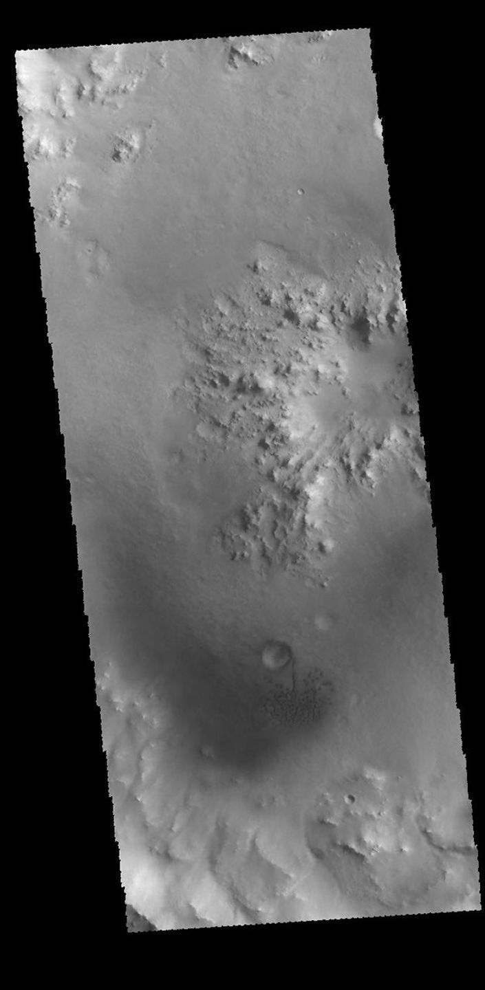This image captured by NASA's 2001 Mars Odyssey spacecraft shows the interior of an unnamed crater near Nili Fossae.